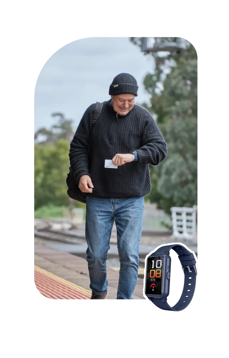 An elder looking at his fall detection watch